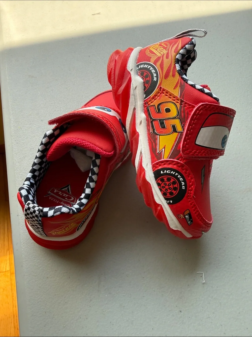 Red Kids Racing Slip-On Sneakers with Flame Graphics